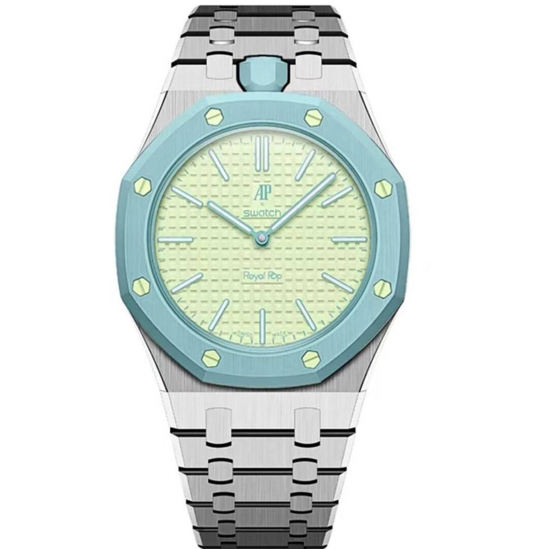 Silver metal Royal Pop watch with a pale cream dial and light blue bezel on a white background.